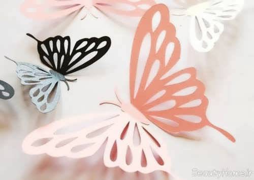 تزیین اتاق کودک با پروانه های کاغذی 