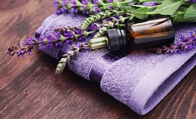 Sage-oil-with-Lavender-and-towel