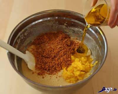 افزودن روغن و پودر کاکائو به مایه کیک