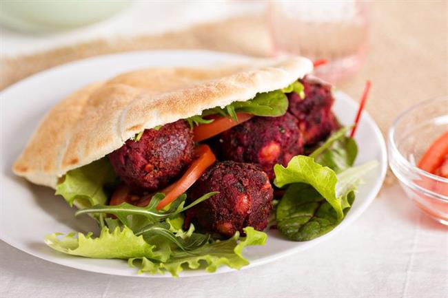 Beetroot falafel served with salad in a pita. Photo: Elena Veselova/Shutterstock