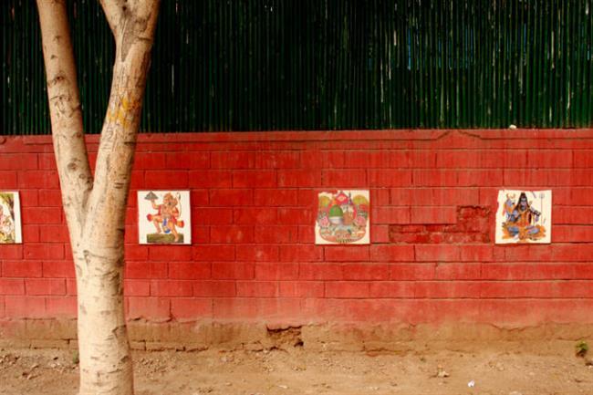 20150207-wall-with-gods-to-prevent-urination-delhi-venus-upadhayaya1-w700