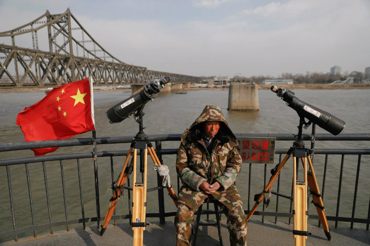 تصاویر کم نظیر و دلهره آوری که زندگی در مرز چین و کره شمالی را نشان می دهند