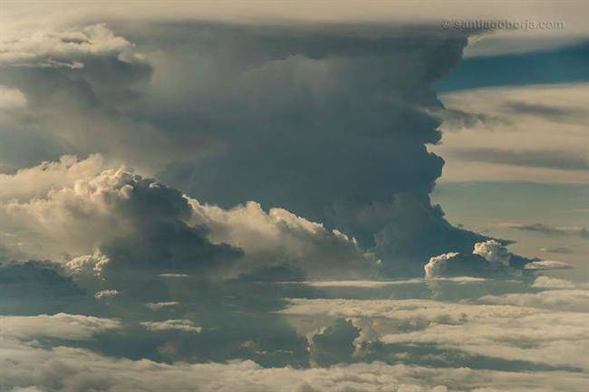 pilot-clouds-lightning-night-skies-santiago-borja-lopez-5-591954b95e2a7__880-w700