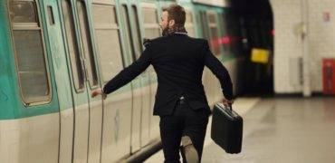 Man running for underground train