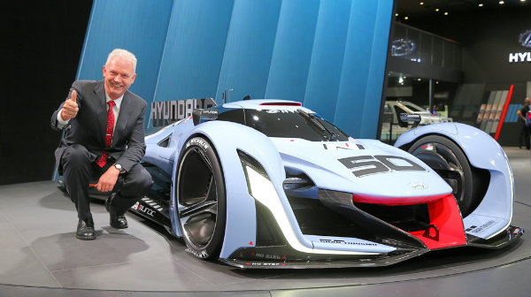 Albert Biermann, vice president of Hyundai Motor Group, poses with the N 2025 Vision Gran Turismo