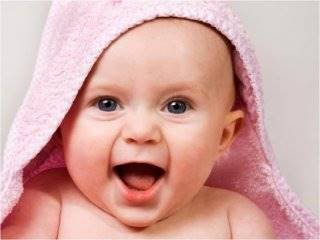 لبخند نوزاد  شما نشانه چیست؟