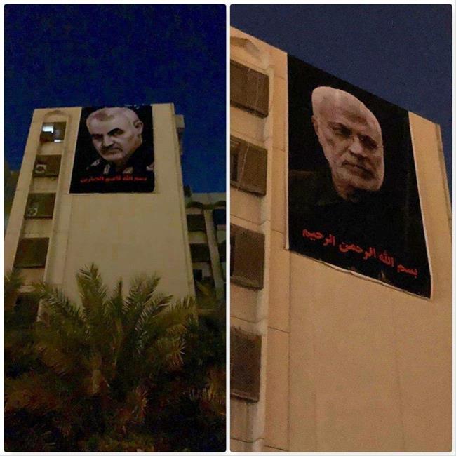 تصاویر شهداء مقاومت روی ساختمان مسکونی مقابل سفارت آمریکا در بغداد