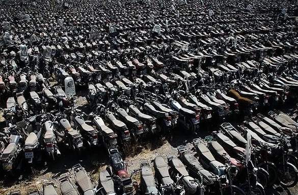سرنوشت موتور سیکلت‌های رسوب شده در پارکینگ‌ها/ رسوب 70 هزار موتور سیکلت توقیفی در پارکینگ‌های پایتخت