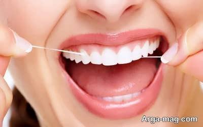 تاثیر استفاده از نخ دندان در رفع جرم دندان