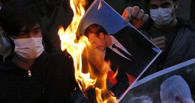 آتش زدن عکس امانوئل ماکرون، رئیس جمهور فرانسه در تهران 