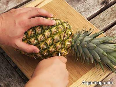 جدا کردن قسمت فوقانی آناناس