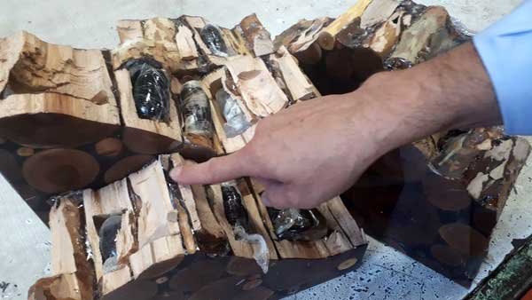 کشف دو کیلو تریاک در باکس چوبی توسط گمرک