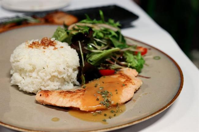 Japanese miso salmon with rice and salad. Photo: Joyce Mar/Shutterstock