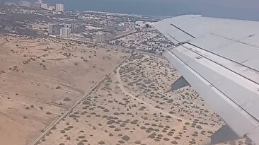لحظه آتش گرفتن موتور هواپیما کیش به مشهد بالا سر جزیره کیش (فیلم)